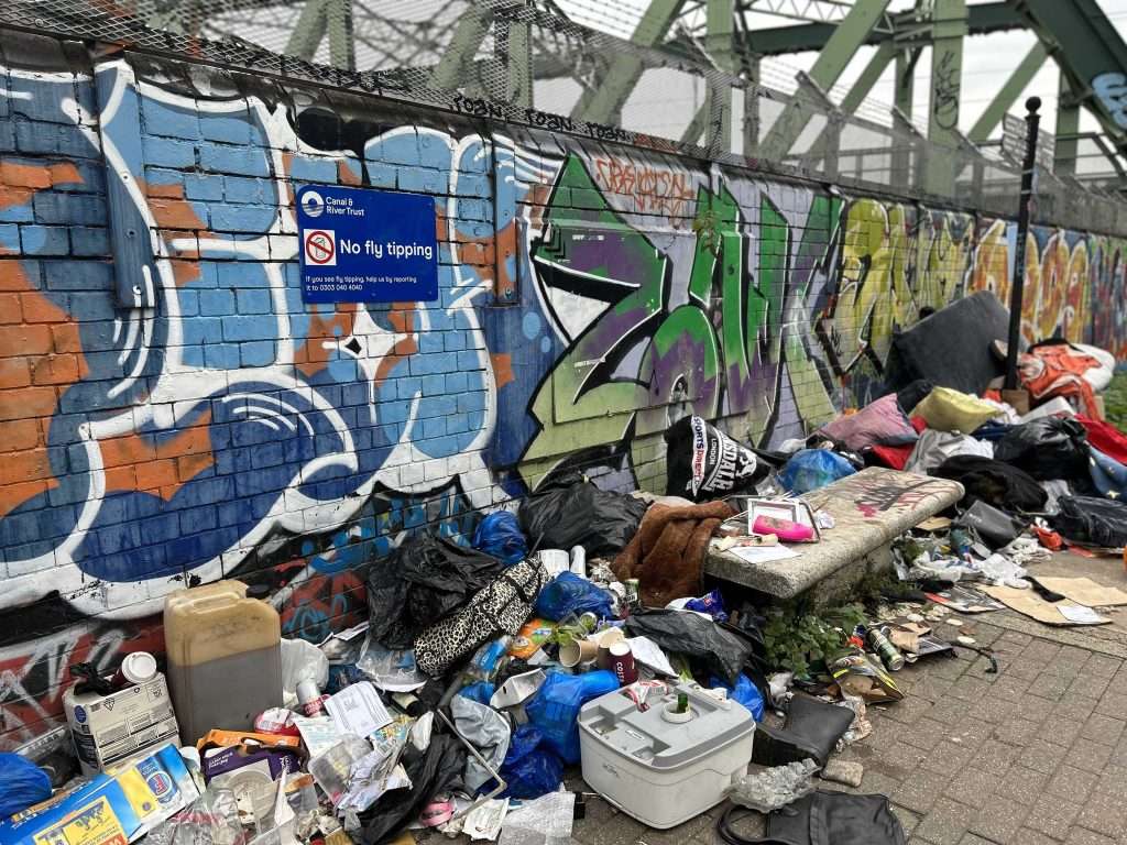 Fly tipping by canal