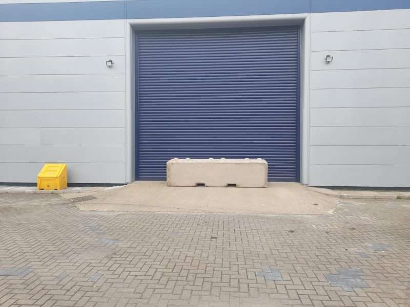 xl concrete barrier blocking a warehouse