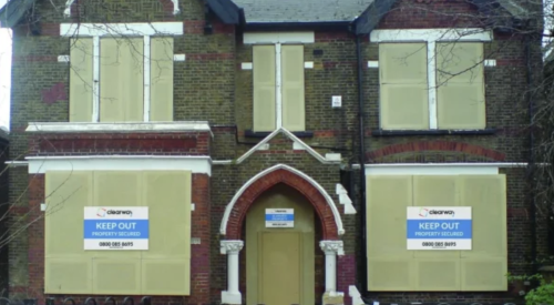 Boarded up property from Clearway